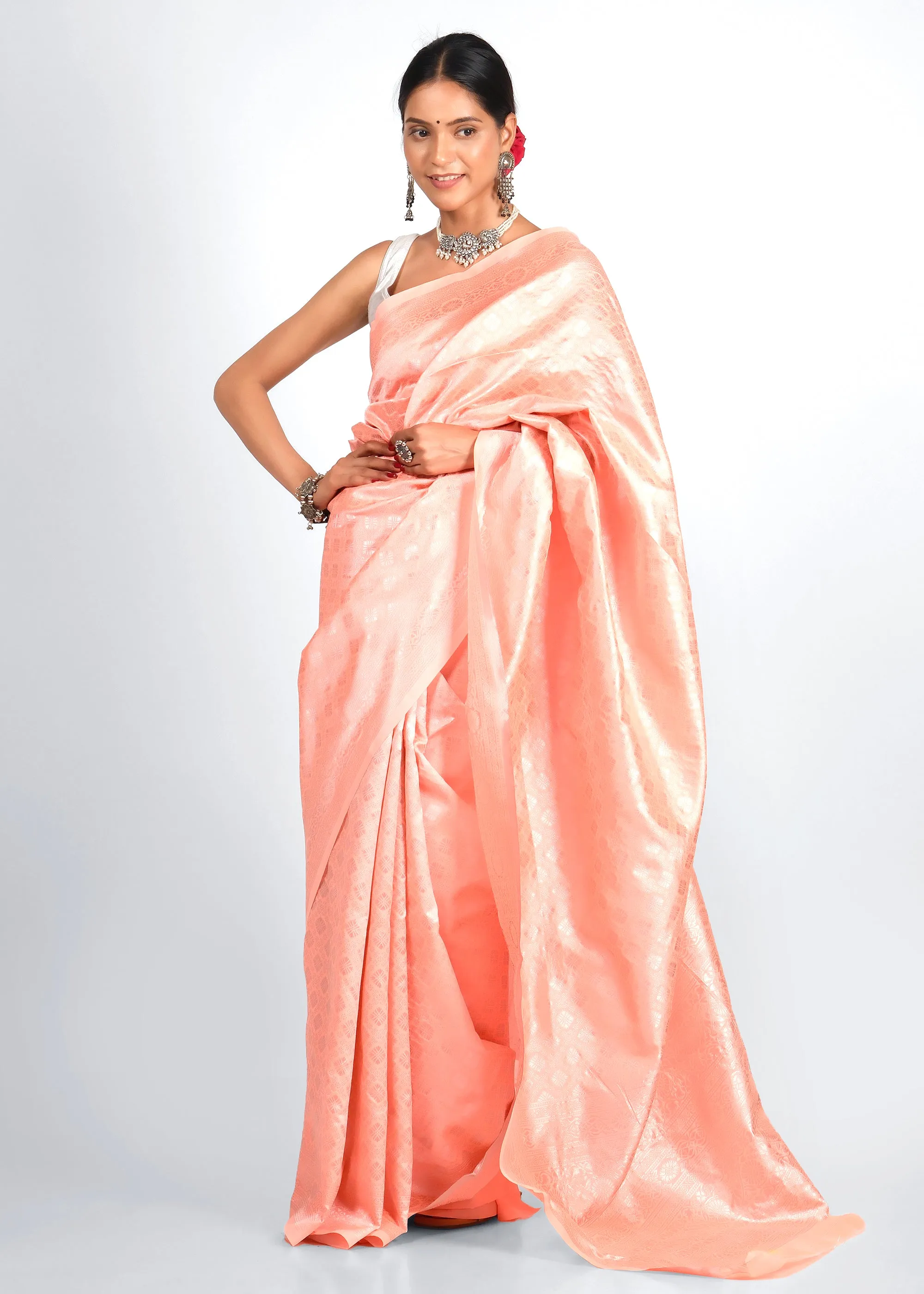 Delicate Peach Elegance - A Saree of Timeless Grace