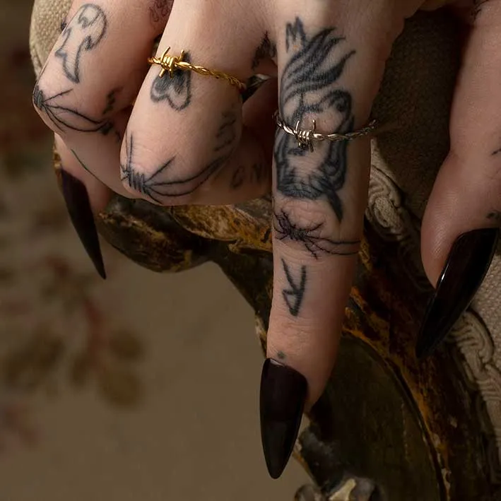 SURVIVAL. Symbolic Barbed Wire Ring - Gold